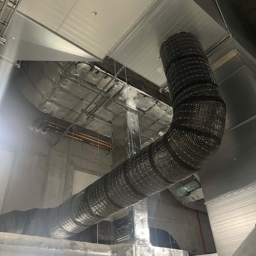 Ventilationsisolering af ventilationskanaler i erhvervsbyggeri